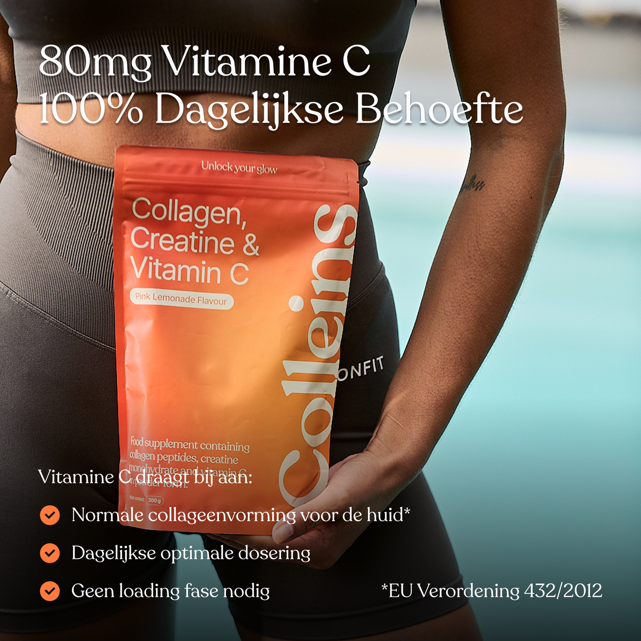 Colleins Pink Lemonade in a clear glass with fresh lemon slices and ice, set against a vibrant background.